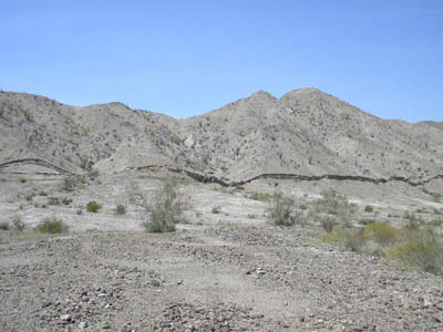 This five-foot-high (1.5-meter-high) surface rupture, called a scarp, formed in just seconds along the Borrego fault during the magnitude 7.2 El Mayor Cucapah earthquake in northern Baja California on 4 April 2010. NASA says topographic surveys of the surrounding landscape reveal the complexity of earthquake deformation, including how this fault interacted with adjacent faults. Image credit: Centro de Investigacion Cientifica y de Educacion Superior de Ensenada (CICESE)