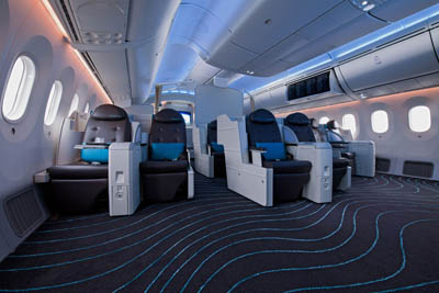 Futuristic aspects of the Boeing Dreamliner include a business-class cabin with 12 lay-flat seats