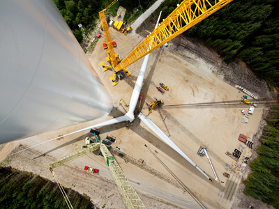The Siemens rotor, which consists of three 75-metre rotor blades and has a diameter of 154 metres, pictured being assembled on the ground at the Østerild test centre in Denmark. Image via Siemens