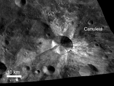 In this image from NASA's Dawn spacecraft, the scientists said bright material extends out from the crater Canuleia on Vesta. The bright material appears to have been thrown out of the crater during the impact that created it, they said. Image credit: NASA/JPL-Caltech/UCLA/MPS/DLR/IDA/UMD