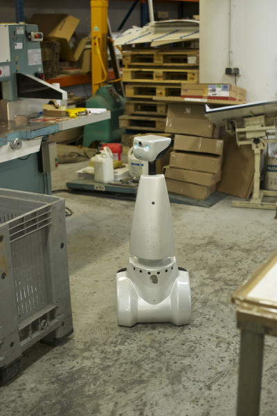 Jazz robot surveying a factory floor