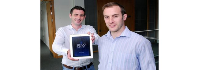 Eoin O'Carroll and Kevin Bambury pictured with the ONCOassist app