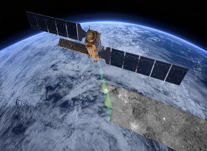 Illustration of the Sentinel 1 satellite observing Earth from space. The planet can be seen in the distance.