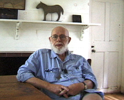 The late Edward Gorey, pictured in the kitchen of his home at Yarmouth, Cape Cod in August 1999. Image via Wikimedia Commons