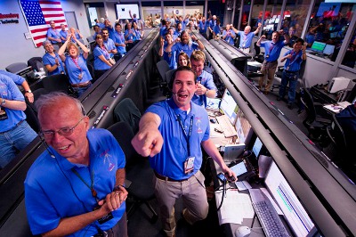 The Mars Science Laboratory (MSL) team pictured in Pasadena, California after learning the Curiosity rover has landed safely on Mars. Photo credit: NASA/Bill Ingalls