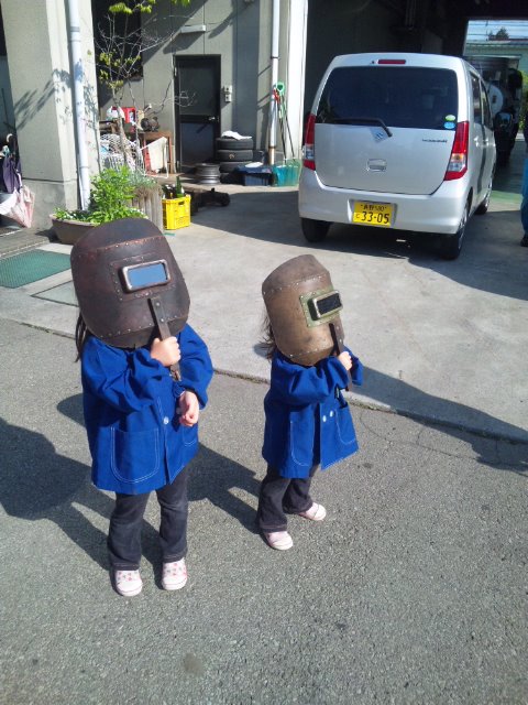 Two Japanese girls watch the eclipse