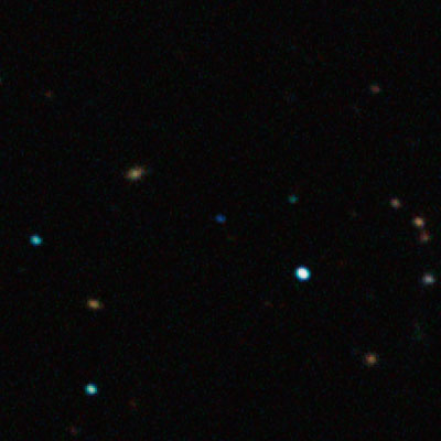 This image captured by the SOFI instrument on ESO's New Technology Telescope shows the free-floating planet CFBDSIR J214947.2-040308.9 in infrared light. This object appears as a faint blue dot at the centre of the picture. Credit: ESO