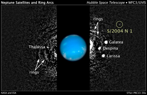 This composite Hubble Space Telescope picture shows the location of a newly discovered moon, designated S/2004 N 1, orbiting Neptune. The black and white image was taken in 2009 with Hubble's Wide Field Camera 3 in visible light. Hubble took the color inset of Neptune on August 2009. Image Credit: NASA, ESA, M. Showalter/SETI Institute