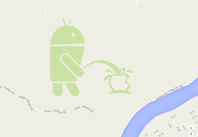 Android relieving itself on an apple