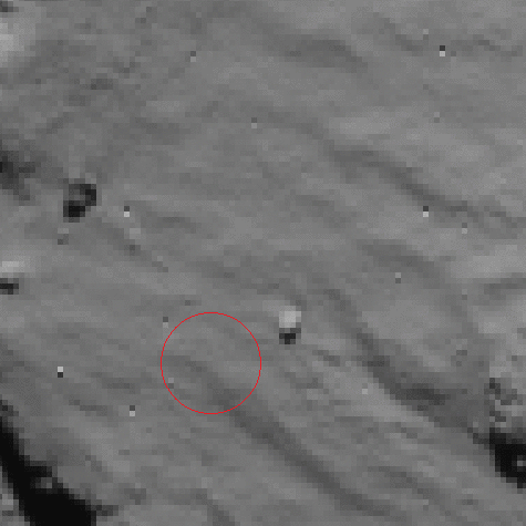 Philae_spotted_by_Rosetta_after_first_landing