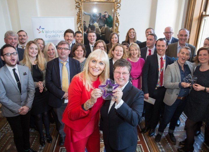 Catherine Vaughan, EY, and Miriam O’Callaghan pictured with winners of the Employer of the Year Award, GLEN 'Best Place to Work for LGBT people'