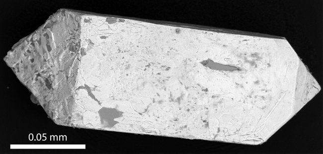 Scanning electron microscope image of a tiny zircon crystal which formed in the Sudbury impact crater - analysis has shown that the oldest zircons on Earth could have formed in a similar setting.tif