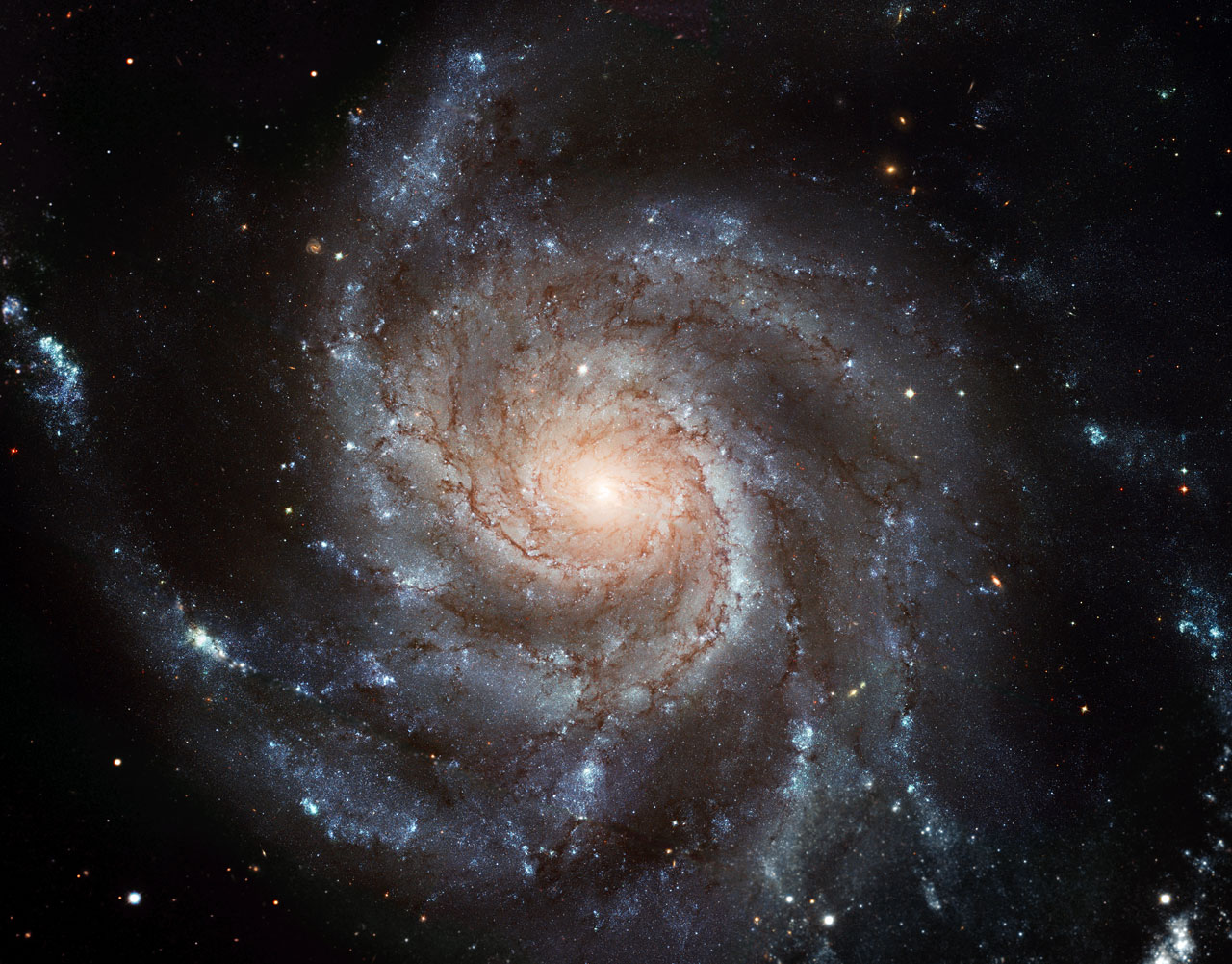 The gigantic Pinwheel galaxy, one of the best known examples of “grand design spirals”, and its supergiant star-forming regions in unprecedented detail. Like UGC 4459, it’s situated on Ursa Major, via ESA/NASA