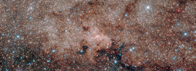 The blue stars you see in the picture – related to the four-strong image above – are in the foreground, but everything else is part of the Milky Way’s nuclear star cluster, the densest collection of stars in our galaxy.