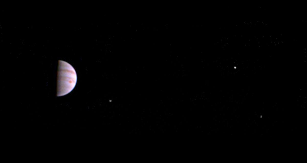 Jupiter, with three of its four moons in shot, via NASA/JPL-Caltech/SwRI/MSSS (click to enlarge)