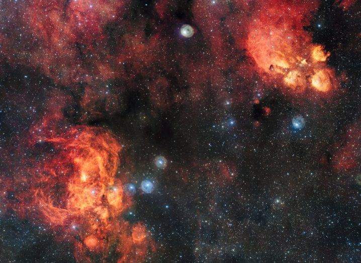 The Cat’s Paw Nebula (NGC 6334, upper right) and the Lobster Nebula (NGC 6357, lower left). These dramatic objects are regions of active star formation where the hot young stars are causing the surrounding hydrogen gas to glow red. Image: ESO