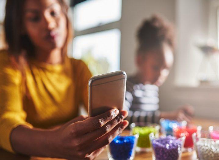 Kid using mobile phone