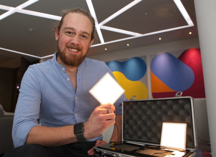 Matt Hanbury showcases the slim lighting tile from Lightly Technologies at an event in William Fry, Dublin