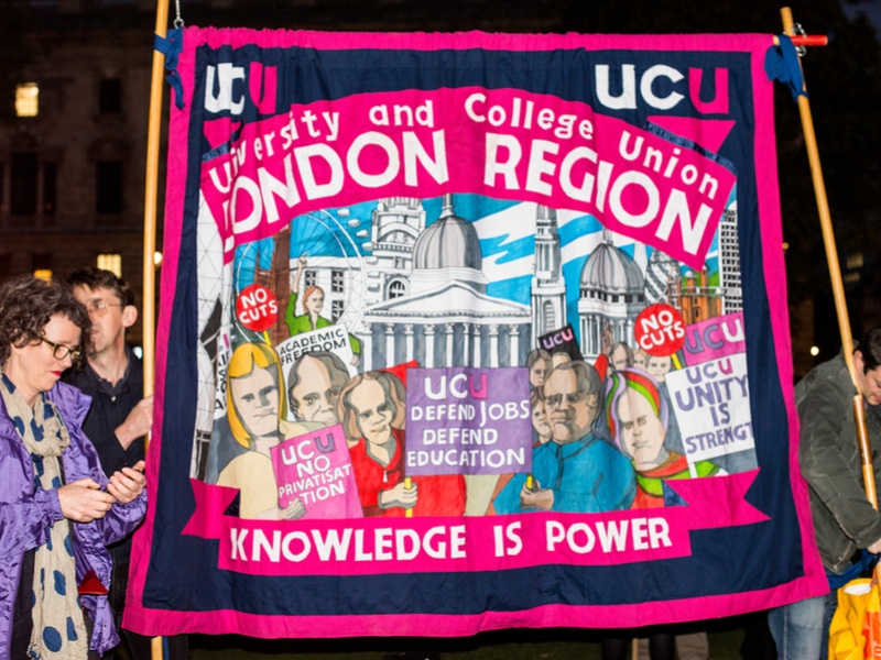 Why are lecturers from more than 60 UK universities on strike?