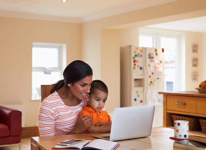 mother and son on computer