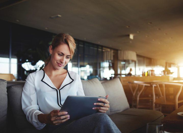 women reading iPad