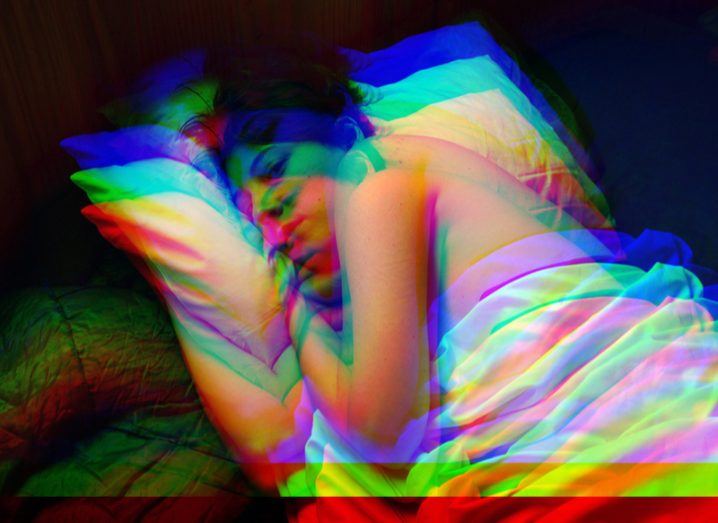 woman in bed glitch effect