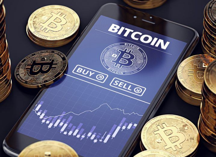 smartphone with a cryptocurrency trading app