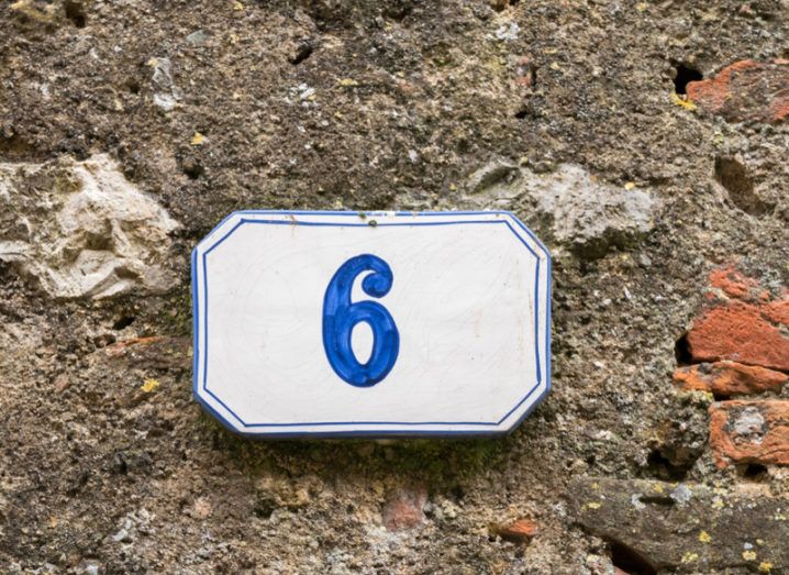 Number 6 on a wall outside a house