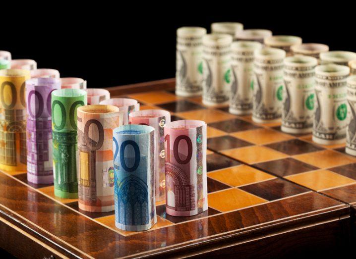 Euros and dollars on chess board