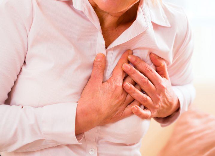 Woman having heart attack