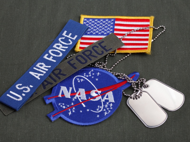 US military and NASA badges. Image: Militarist/Shutterstock