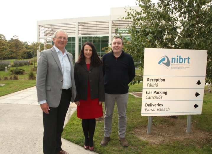 Dominic Carolan, Dr Geraldine Canny, and Dr Colin standing outside the NIBRT campus.