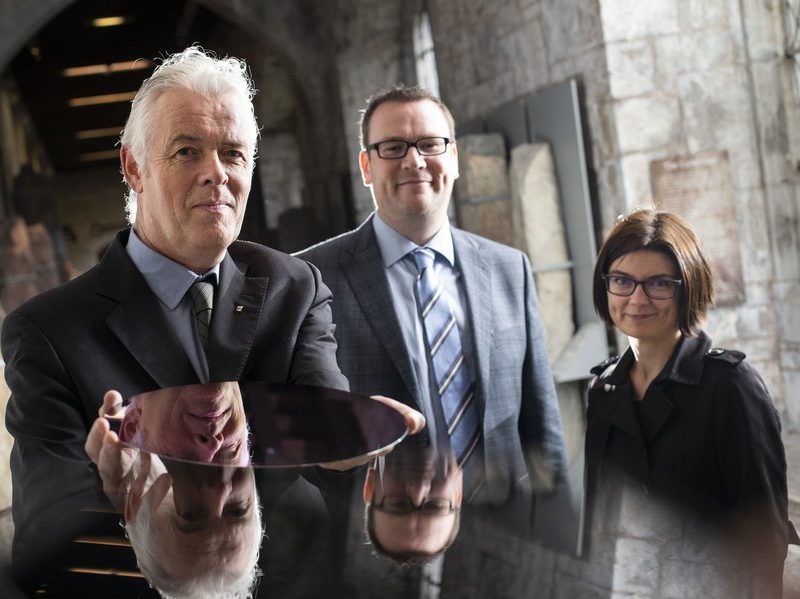 Prof Cian Ó Mathuna, Kieran Meade, Dr Aleksandra Augustyniak smiling in business clothing.