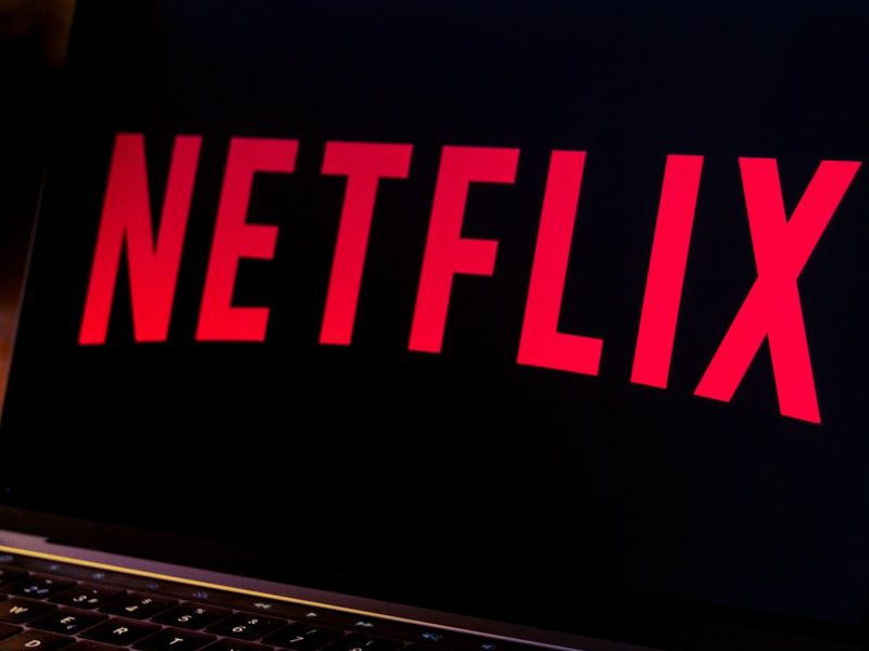 Netflix logo on laptop screen.
