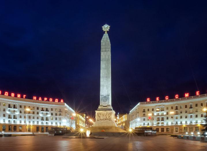 Victory Square in Minsk lit up at night.