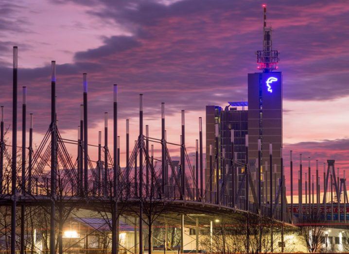 The Hannover Messe fairground under a purple hued sky.