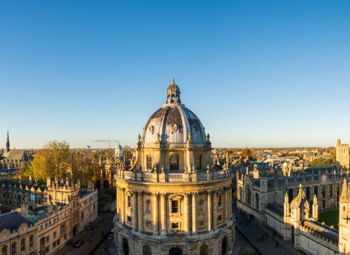 Aerial view of St Mary's Church in Oxford, UK, at sunset.