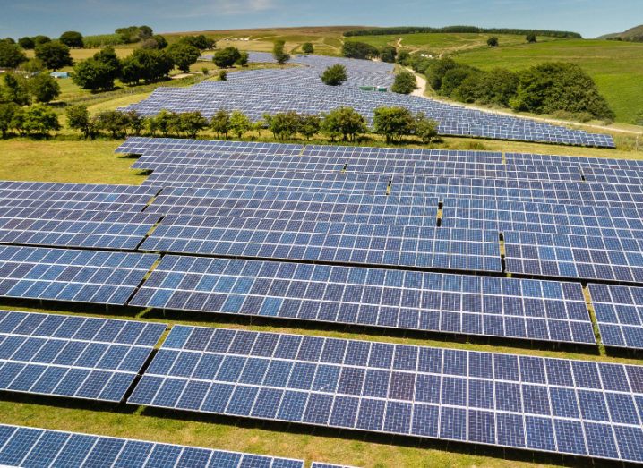 Picture of a field of solar panels in south Wales, UK.