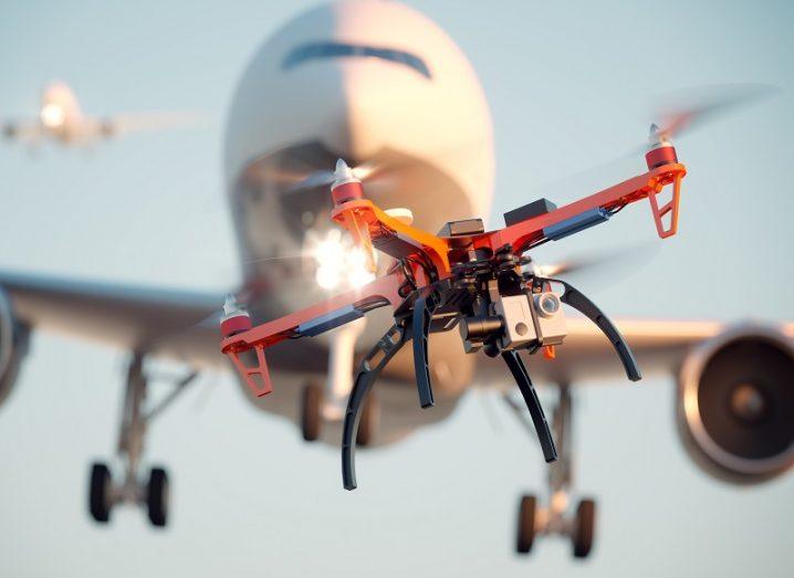 Edited image of a drone flying in front of a landing aircraft.