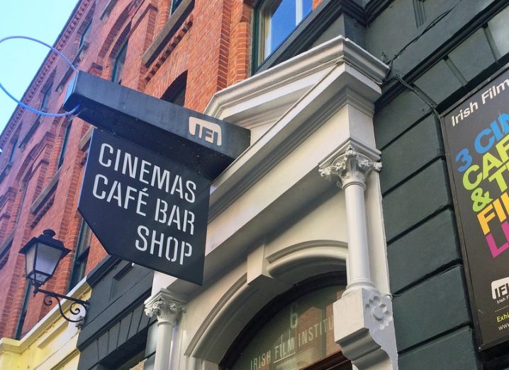 The exterior of the IFI, featuring film posters and Georgian red brick detailing.