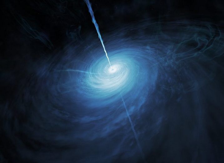An artist's impression of the distant quasar, with blue coloured matter being pulled into a supermassive black hole.