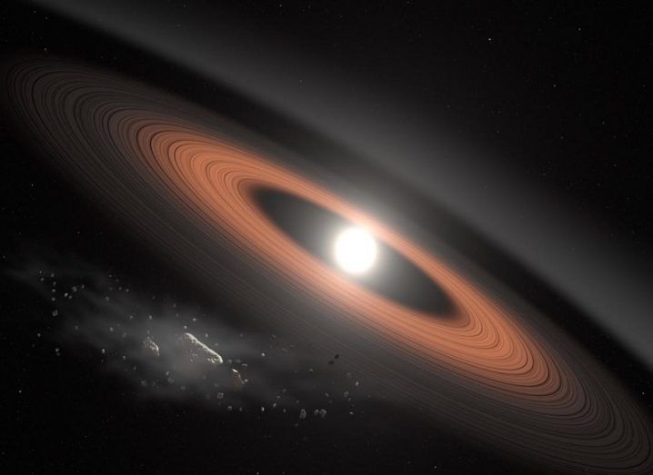A bright white dwarf surrounded by brown and black rings of cosmic material.