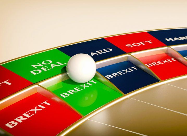 A ball on a roulette table denoting Brexit lands on a green section indicating a no deal Brexit.