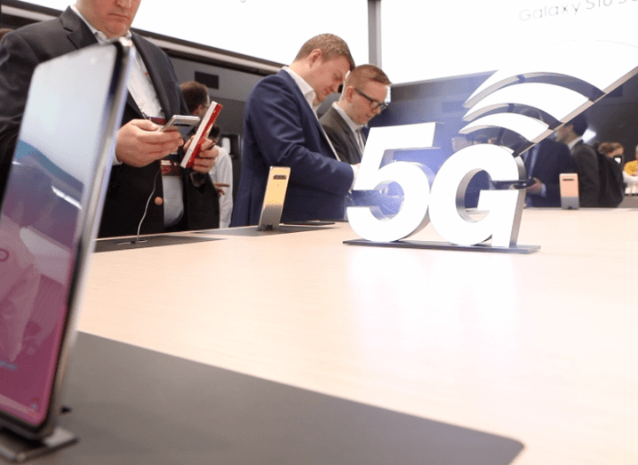 5G official logo on a table of Samsung S10 phones at Mobile World Congress 2019.