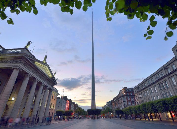 A picture of the famous Spire in the centre of O'Connell Street in Dublin at dusk.