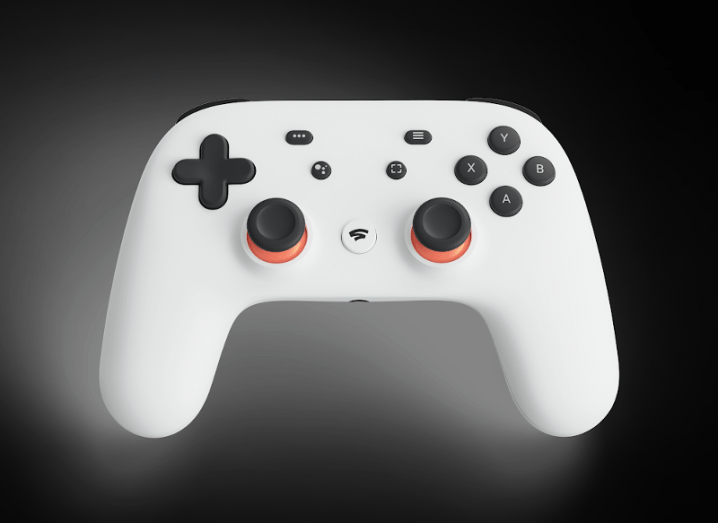 Close-up of a new white gamepad device from Google called the Stadia controller.
