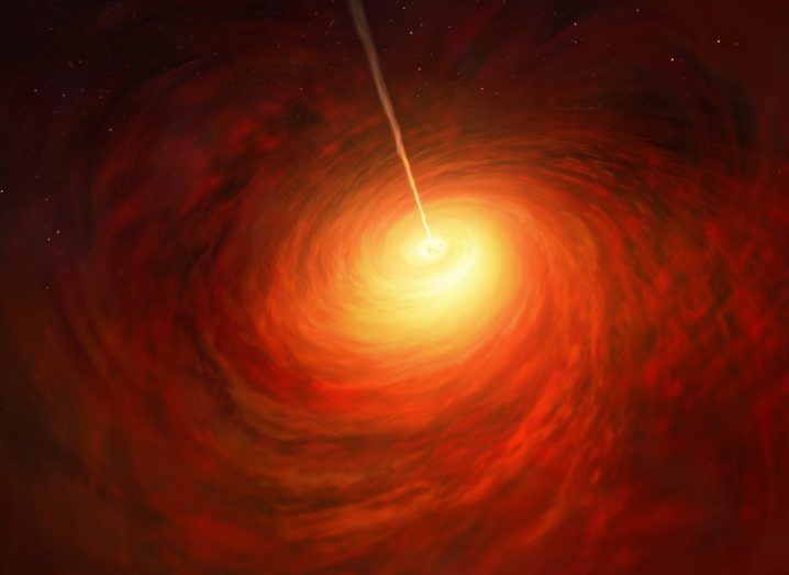 An artist’s impression of the enormous elliptical galaxy M87 with its golden swirling disc.