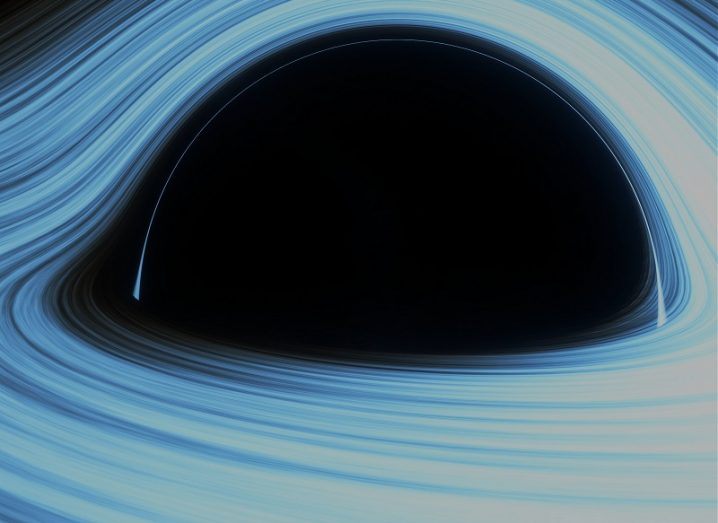Illustration of a supermassive black hole event horizon surrounded by blue cosmic material.