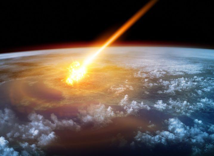 Depiction of a huge asteroid entering Earth's atmosphere.