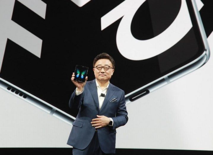 Samsung Electronics’ president and CEO presenting the Galaxy Fold to an audience.